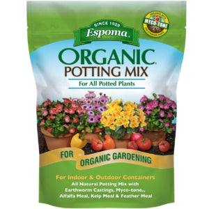 A bag of Espoma® Organic® Potting Mix, ideal for container gardening and all potted plants indoors or outdoors. Featuring natural ingredients, it's perfect for organic gardening with vibrant flowers and tomatoes - Photo Courtesy of Espoma®