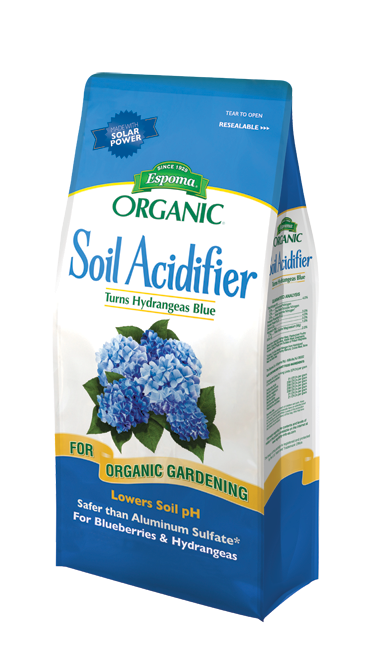 A blue and white bag of Espoma® Organic® Soil Acidifier with blue hydrangea images. This organic product lowers soil pH, is ideal for acid-loving plants, and safe for blueberries and hydrangeas - Photo Courtesy of Espoma®