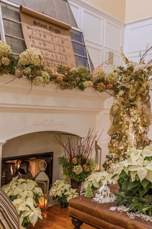 Fireplace with garland of dried hydrangea blooms